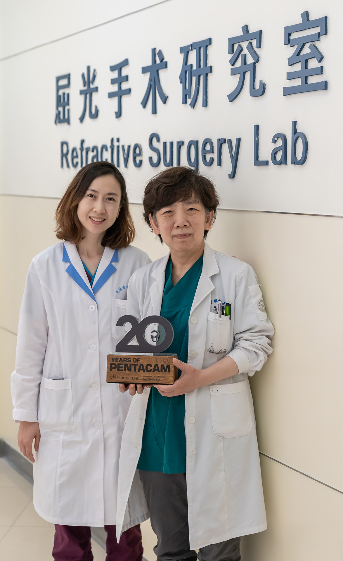 Group photo of Prof Wang Yan (right) and Dr. Zhang Lin (left, one of the key members of her team)
