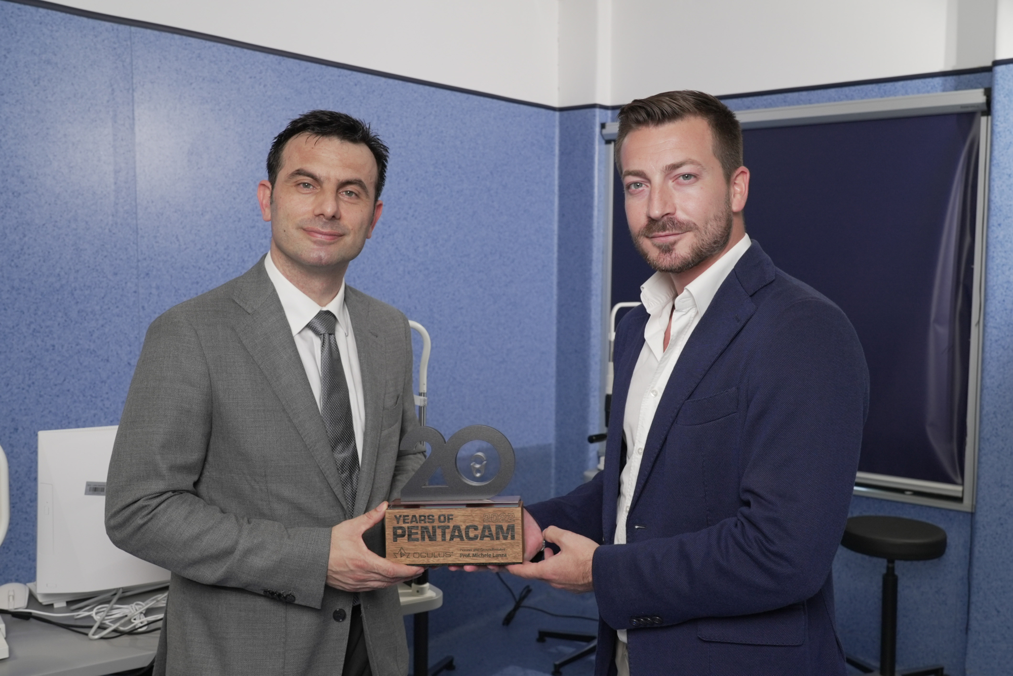 Prof Michele Lanza and Pierpaolo Gabrielli, Chief Operating Officer, holding the 20th Anniversary Pentacam® Trophy